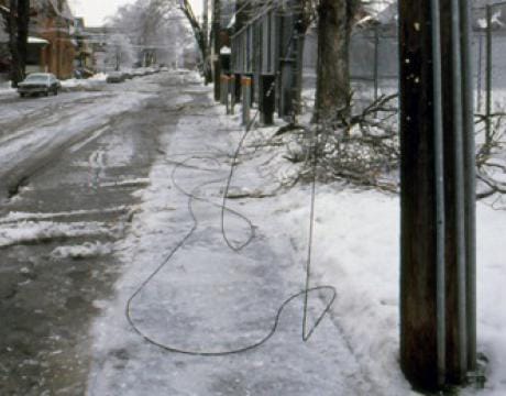 photo of downed powerlines on an icy road